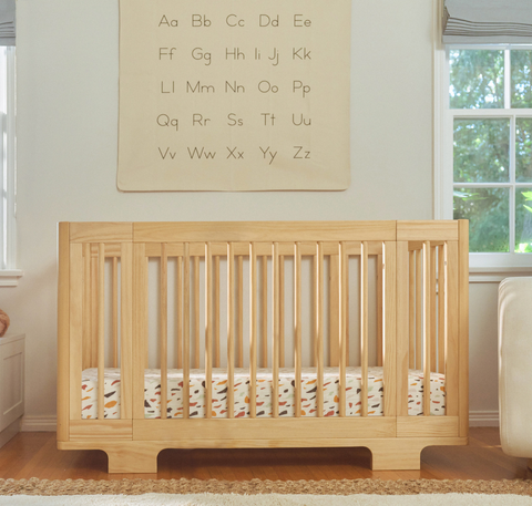 White and top natural wood crib